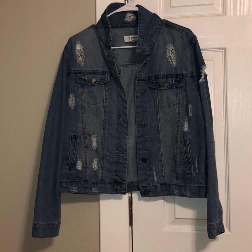 Ripped jean jacket.